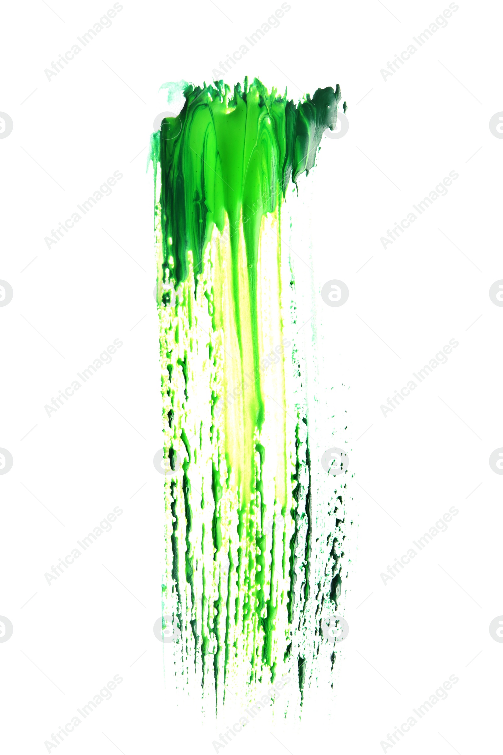 Photo of Abstract brushstroke of green paint isolated on white