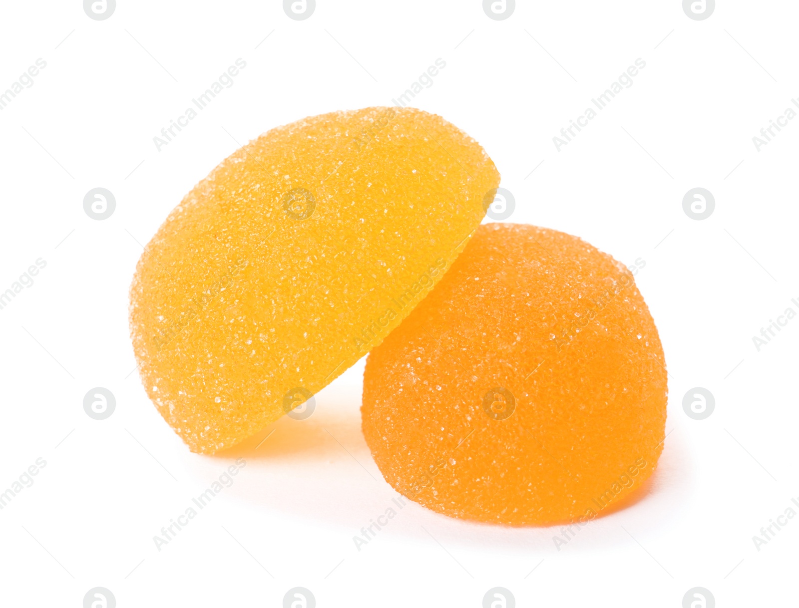 Photo of Bright delicious jelly candies on white background