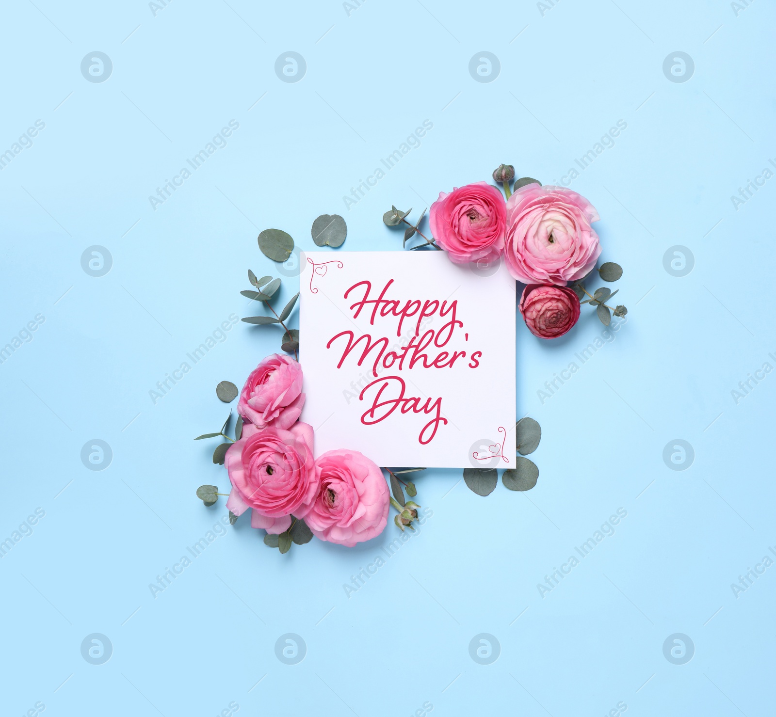 Image of Happy Mother's Day greeting card and beautiful flowers on light blue background, flat lay