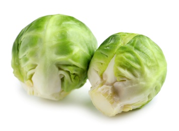 Photo of Fresh tasty Brussels sprouts on white background