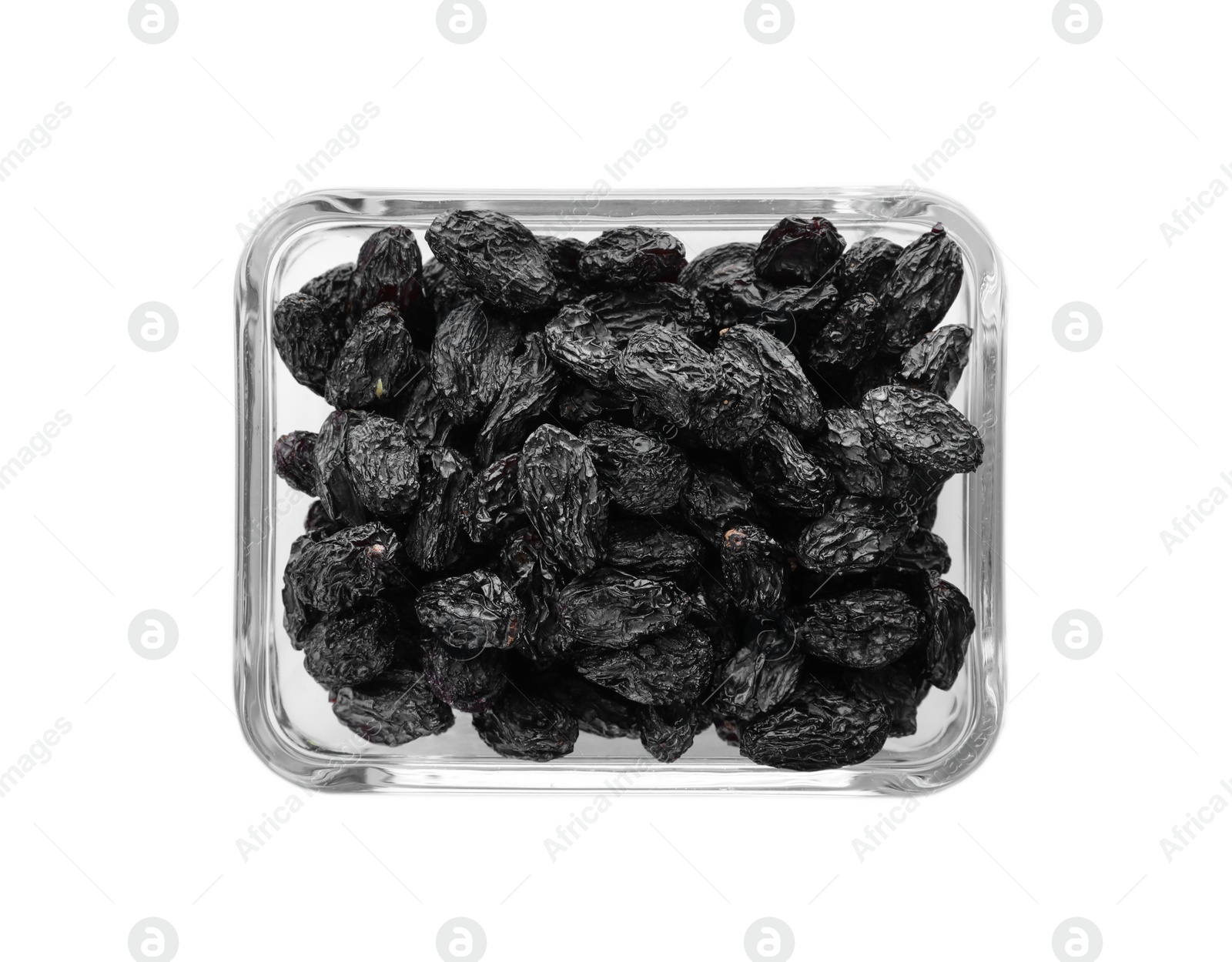 Photo of Bowl with raisins on white background, top view. Healthy dried fruit