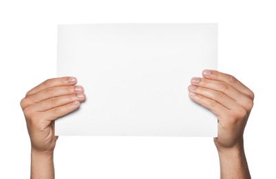 Photo of Man holding sheet of paper on white background, closeup. Mockup for design