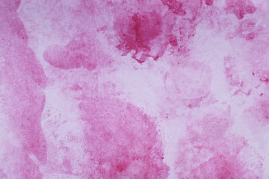 Photo of Abstract magenta watercolor painting as background, top view
