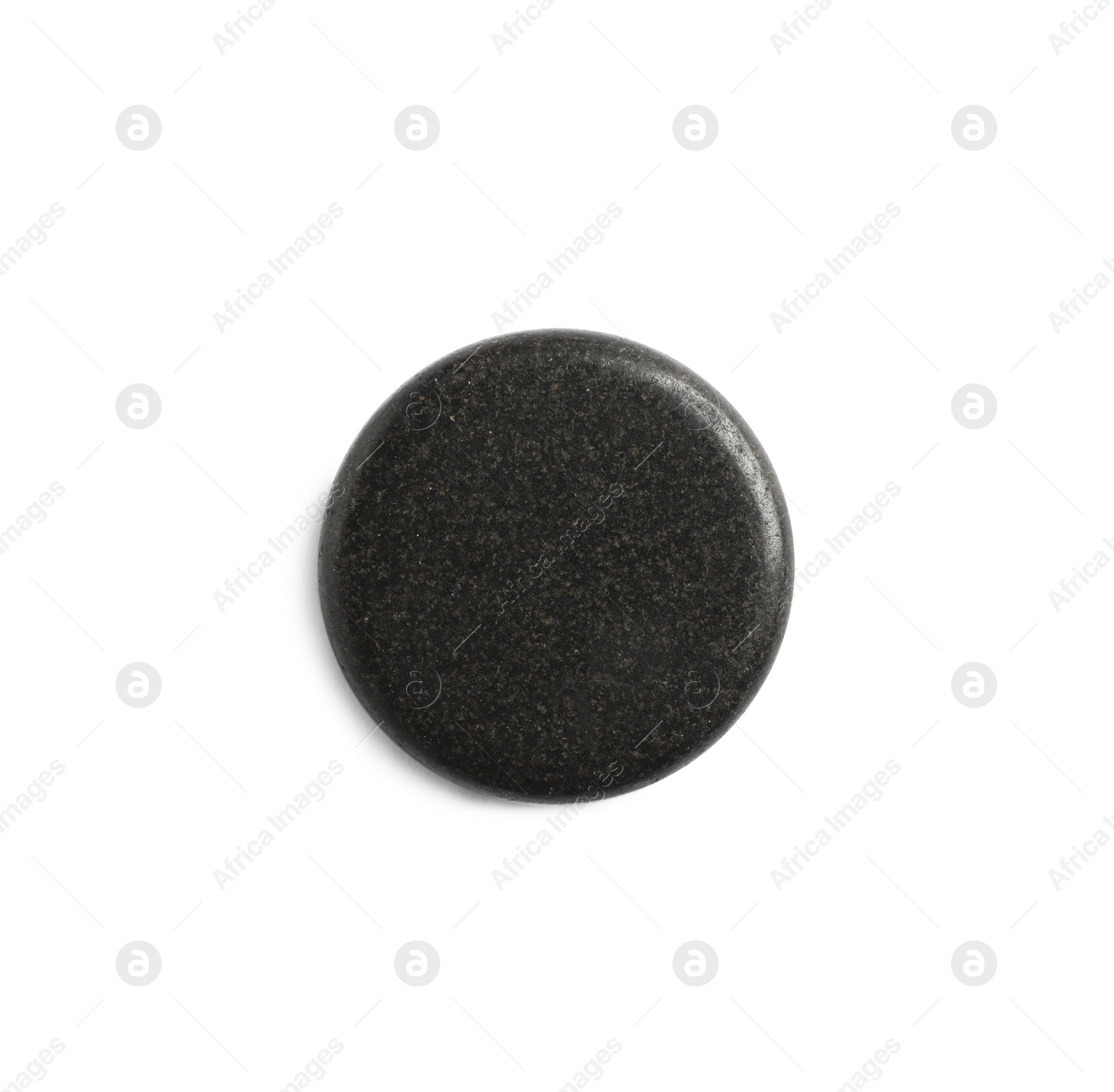 Photo of Black spa stone isolated on white, top view