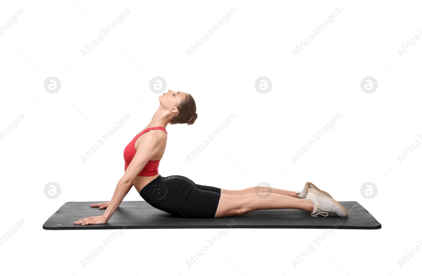 Photo of Young woman practicing yoga on white background