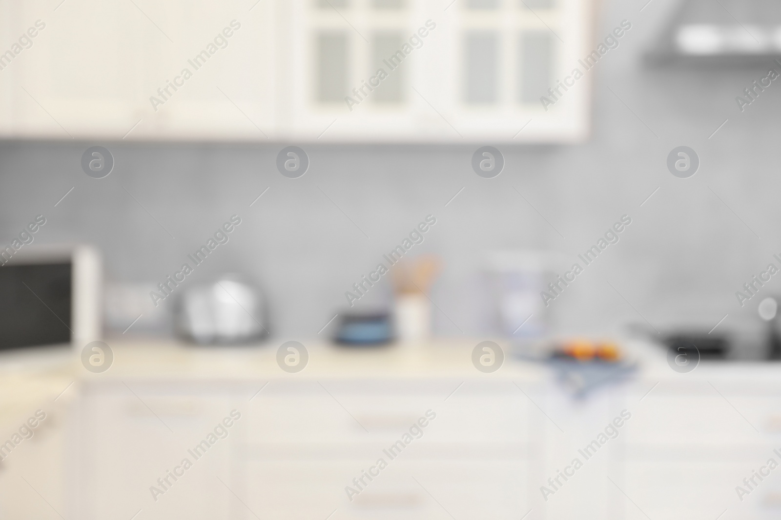 Photo of Blurred view of modern kitchen. Interior design