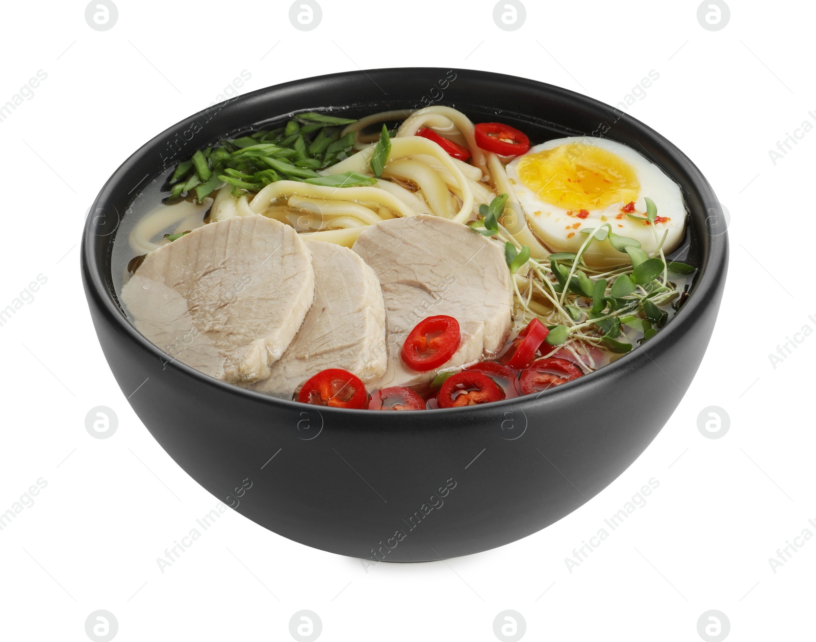 Photo of Delicious ramen with meat and egg in bowl isolated on white. Noodle soup