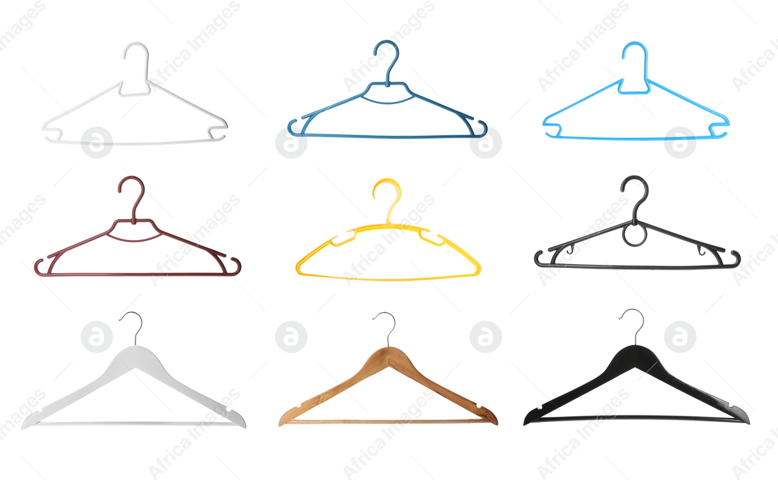 Image of Set with different empty hangers on white background