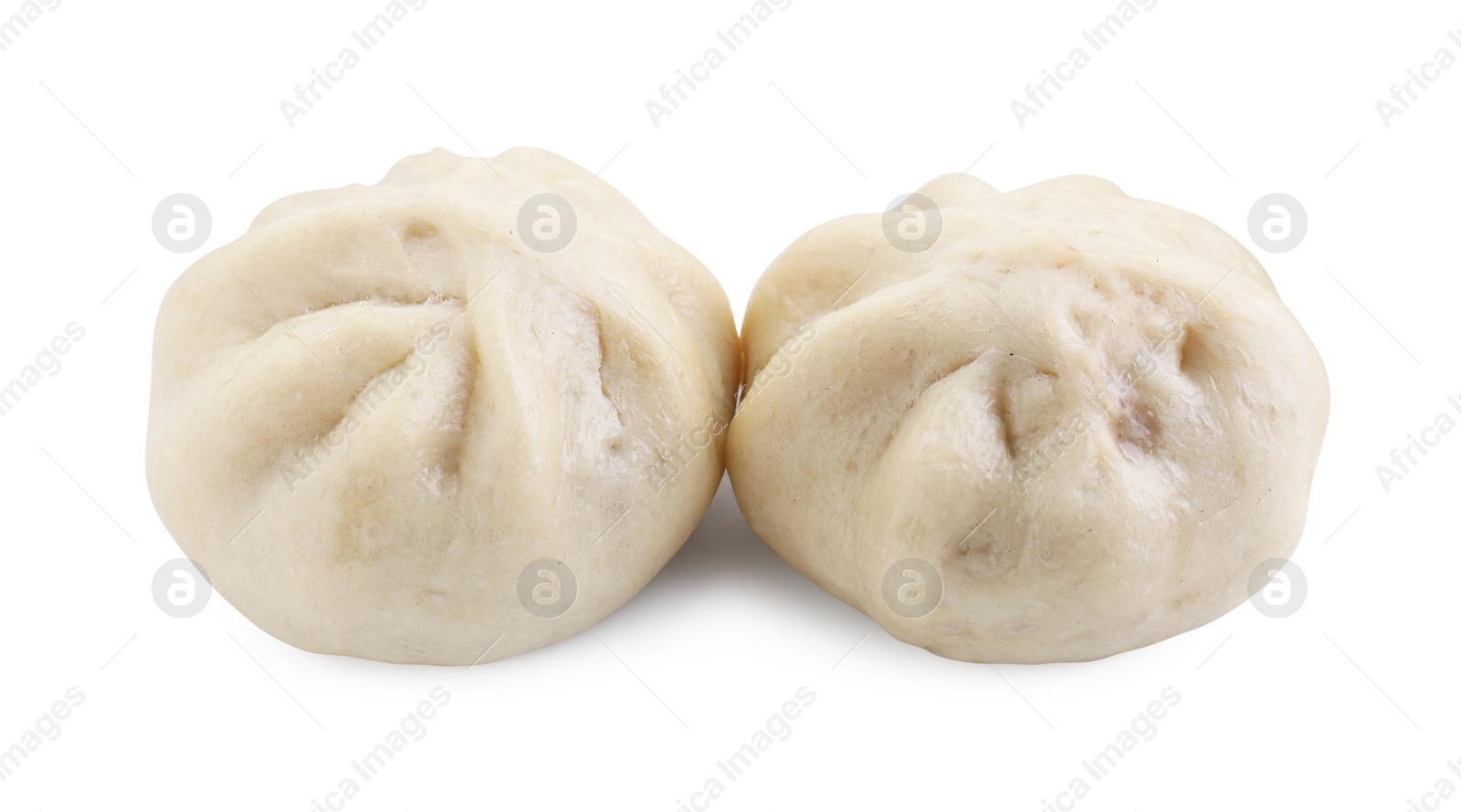 Photo of Delicious bao buns (baozi) isolated on white