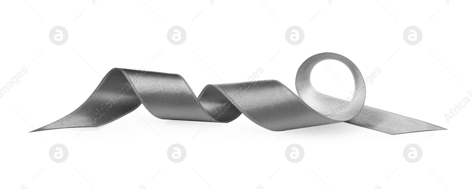 Photo of Beautiful silver ribbon isolated on white. Festive decor