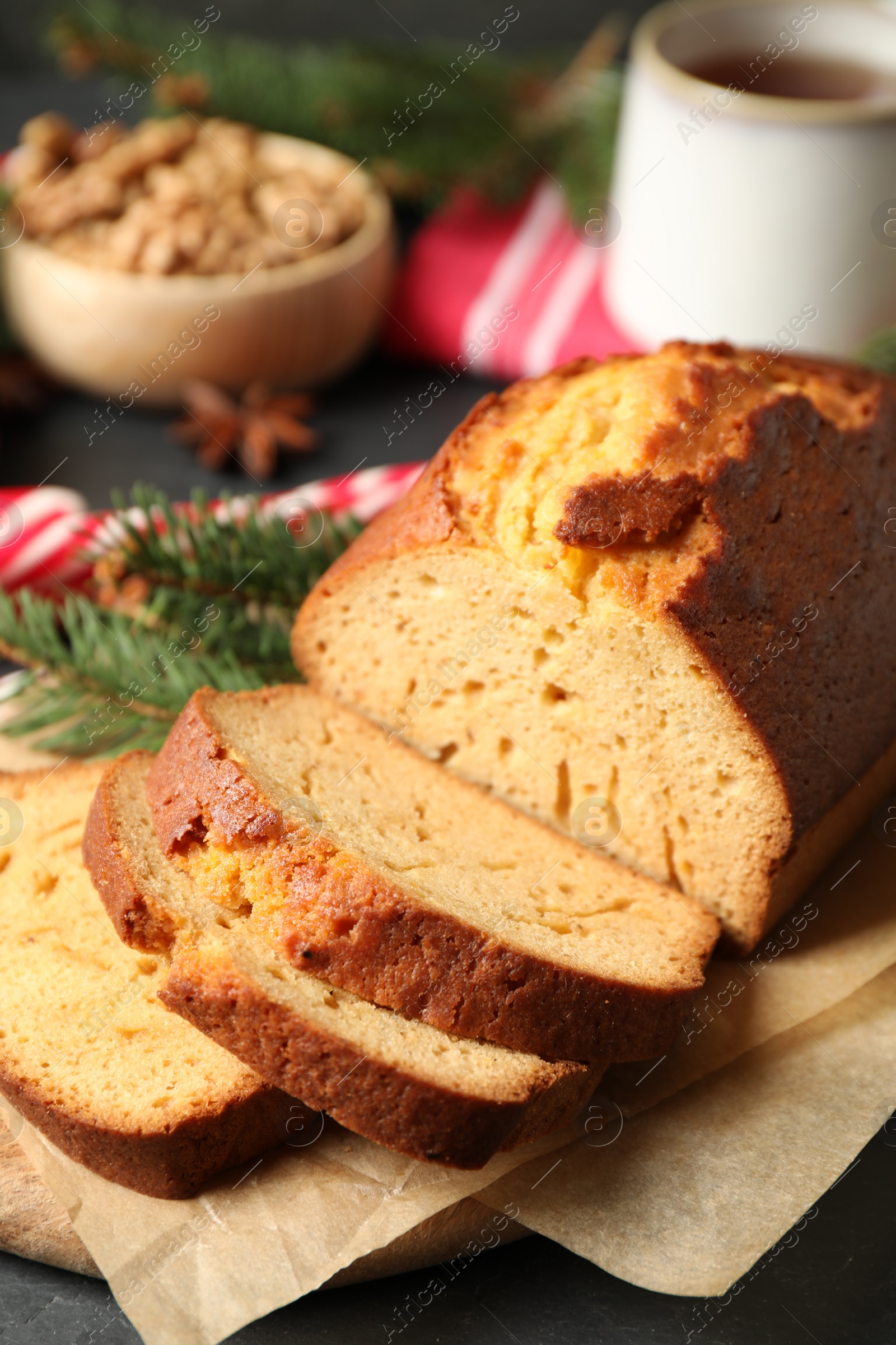 Photo of Fresh sliced gingerbread cake on table, closeup