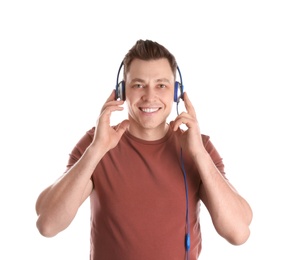 Photo of Man enjoying music in headphones on white background