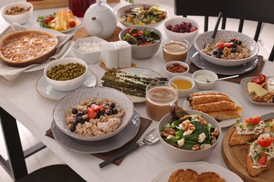 Many different dishes served on buffet table for brunch