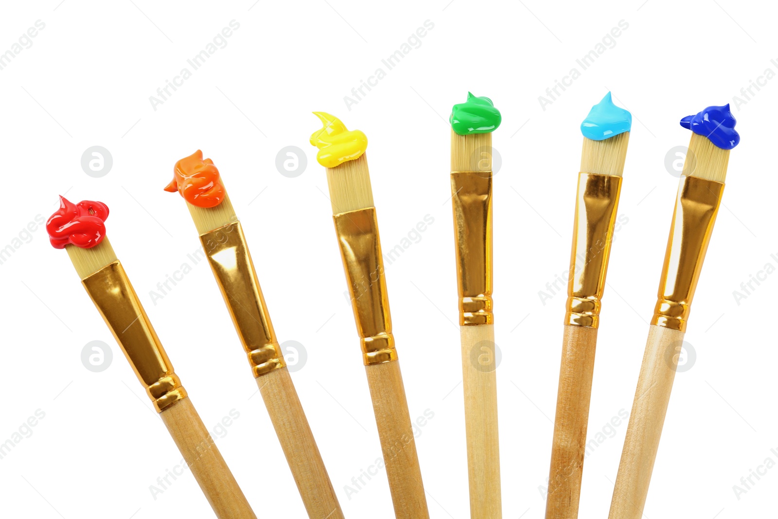 Photo of Brushes with colorful paints on white background