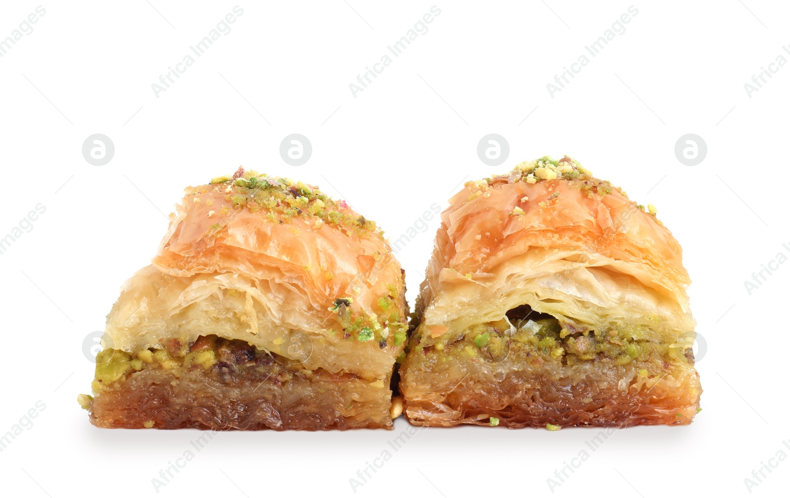 Photo of Delicious fresh baklava with chopped nuts isolated on white. Eastern sweets