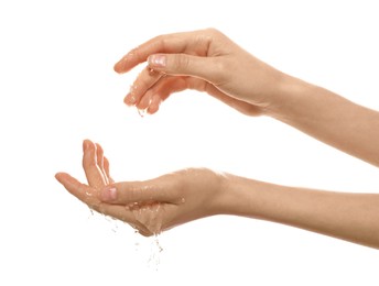 Image of Woman with water in her hands on white background, closeup