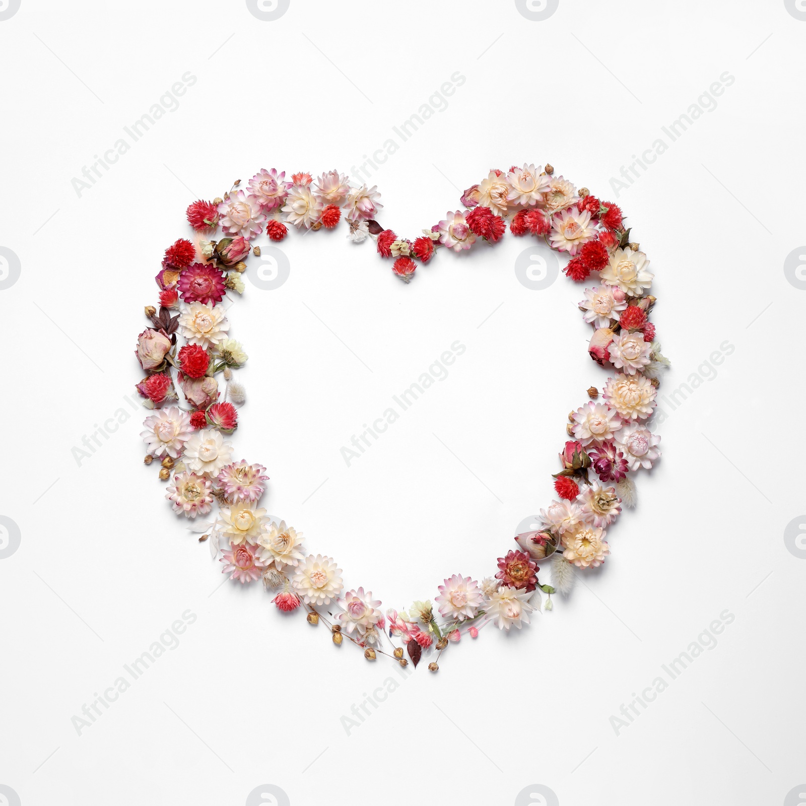 Photo of Beautiful heart shaped floral composition on light background, flat lay