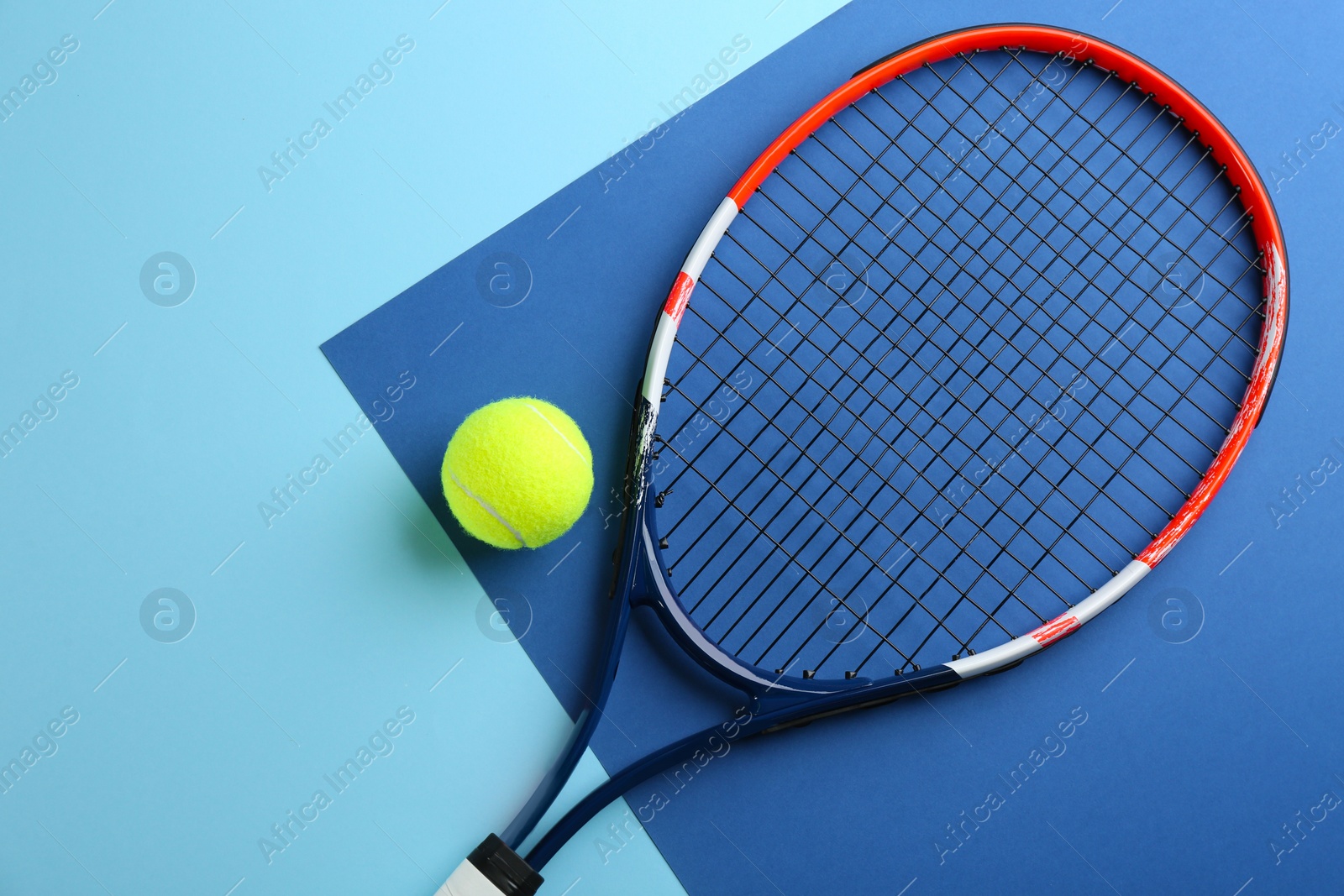 Photo of Tennis racket and ball on color background, flat lay. Sports equipment