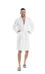 Photo of Handsome man wearing bathrobe on white background