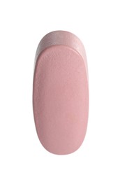 Photo of One pink pill isolated on white. Medicinal treatment