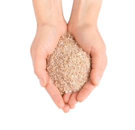 Woman with pile of wheat bran on white background, top view