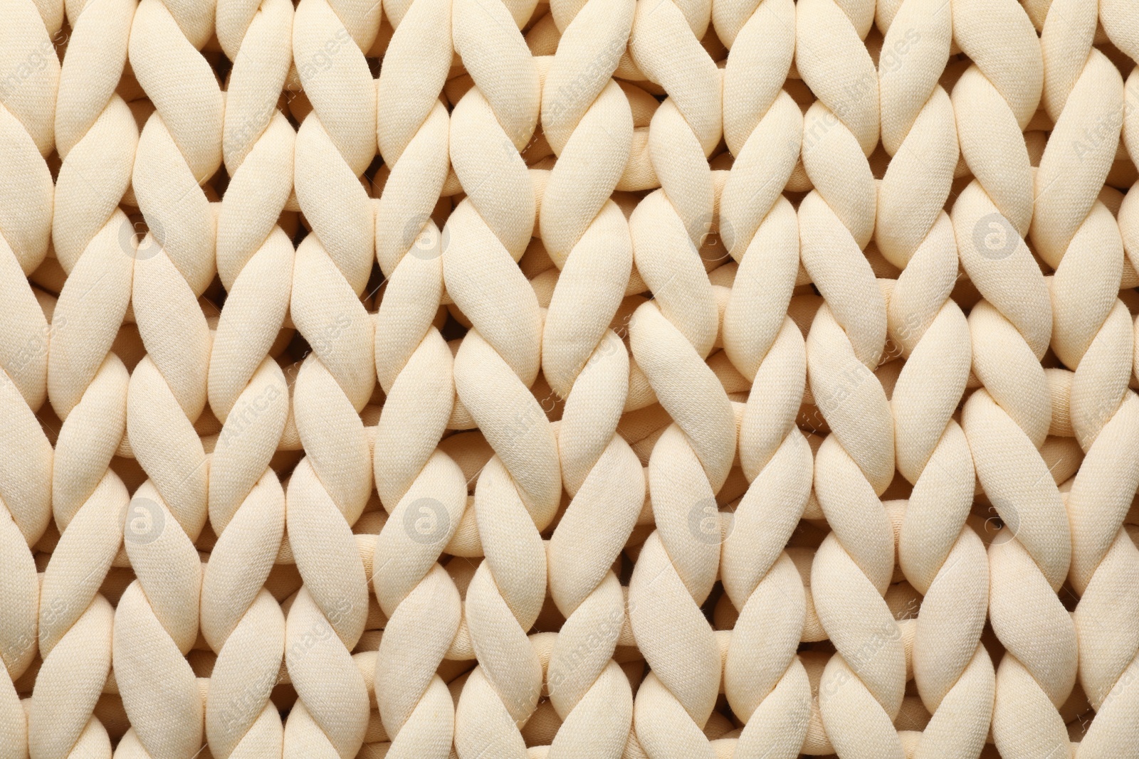 Photo of Chunky knit blankets as background, top view