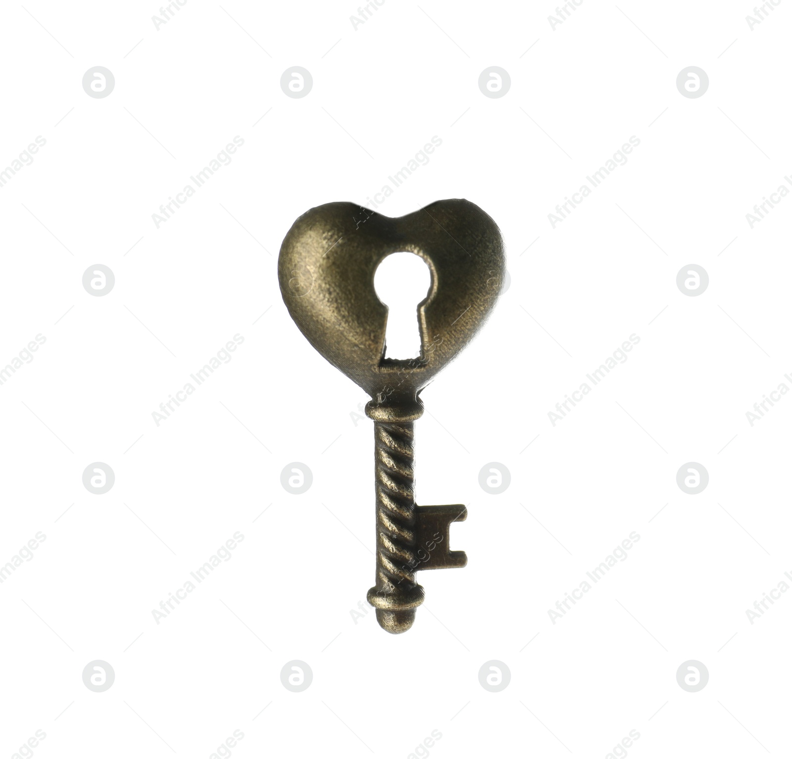 Photo of Bronze vintage ornate key on white background