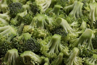 Fresh raw broccoli as background, closeup view