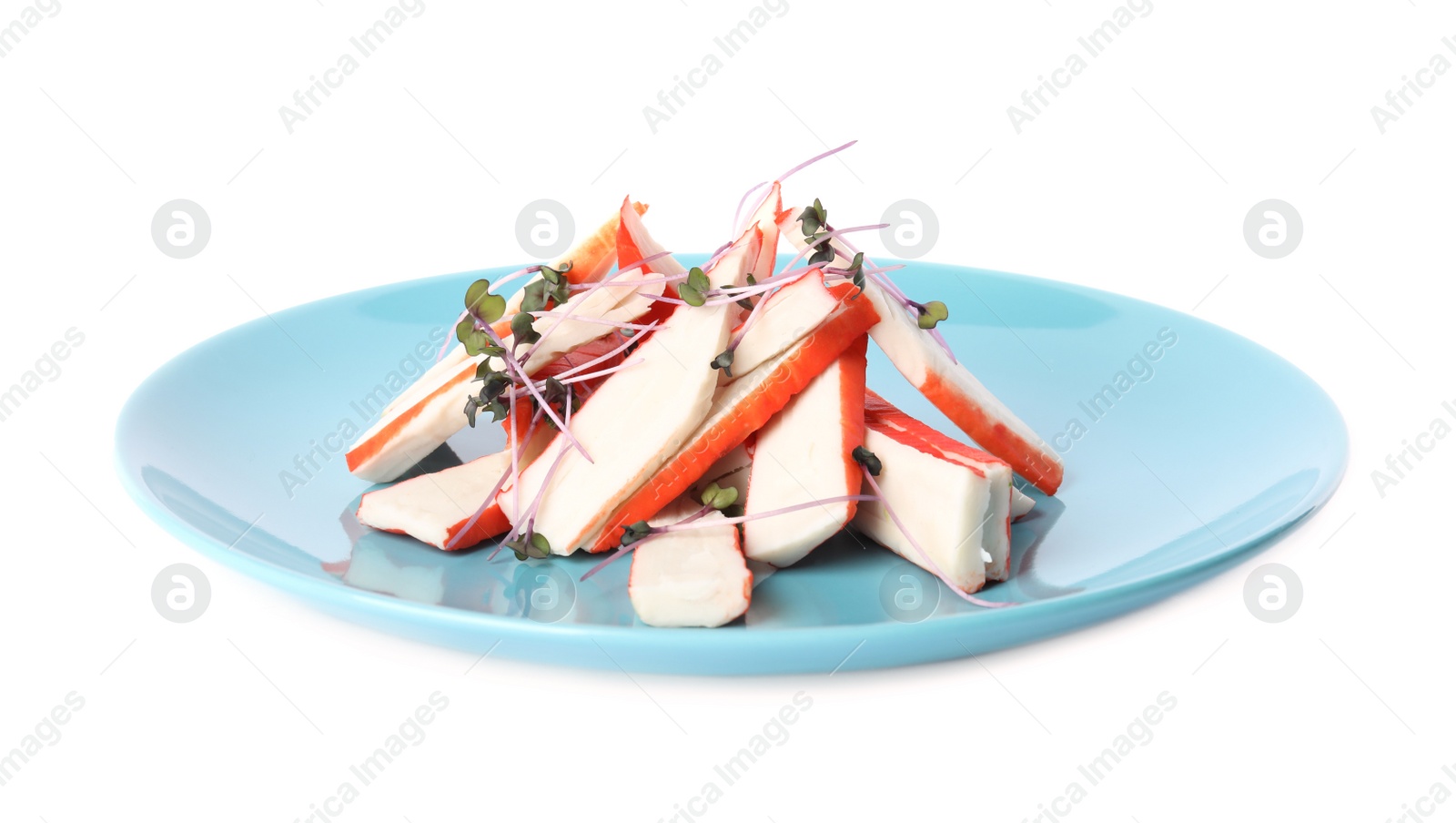 Photo of Fresh cut crab sticks on white background