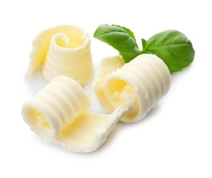 Tasty butter curls on white background