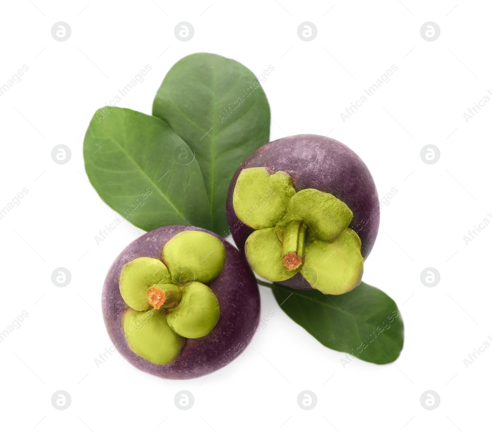 Photo of Delicious ripe mangosteens and green leaves on white background, top view