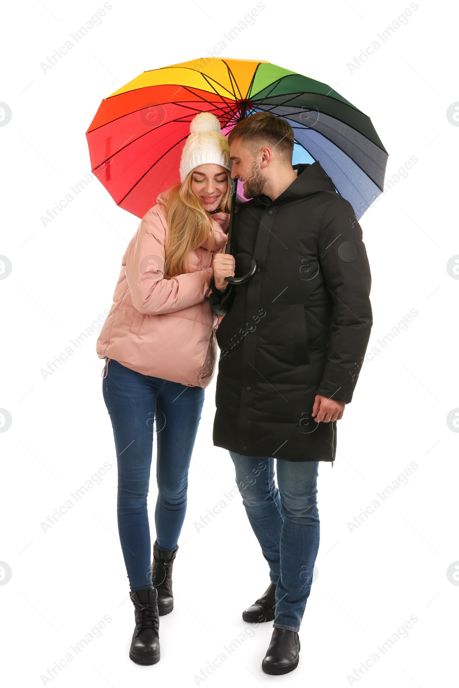 Photo of Full length portrait of beautiful couple with umbrella, isolated on white