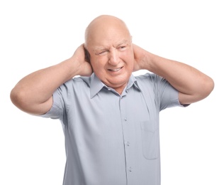 Photo of Senior man suffering from pain in neck on white background