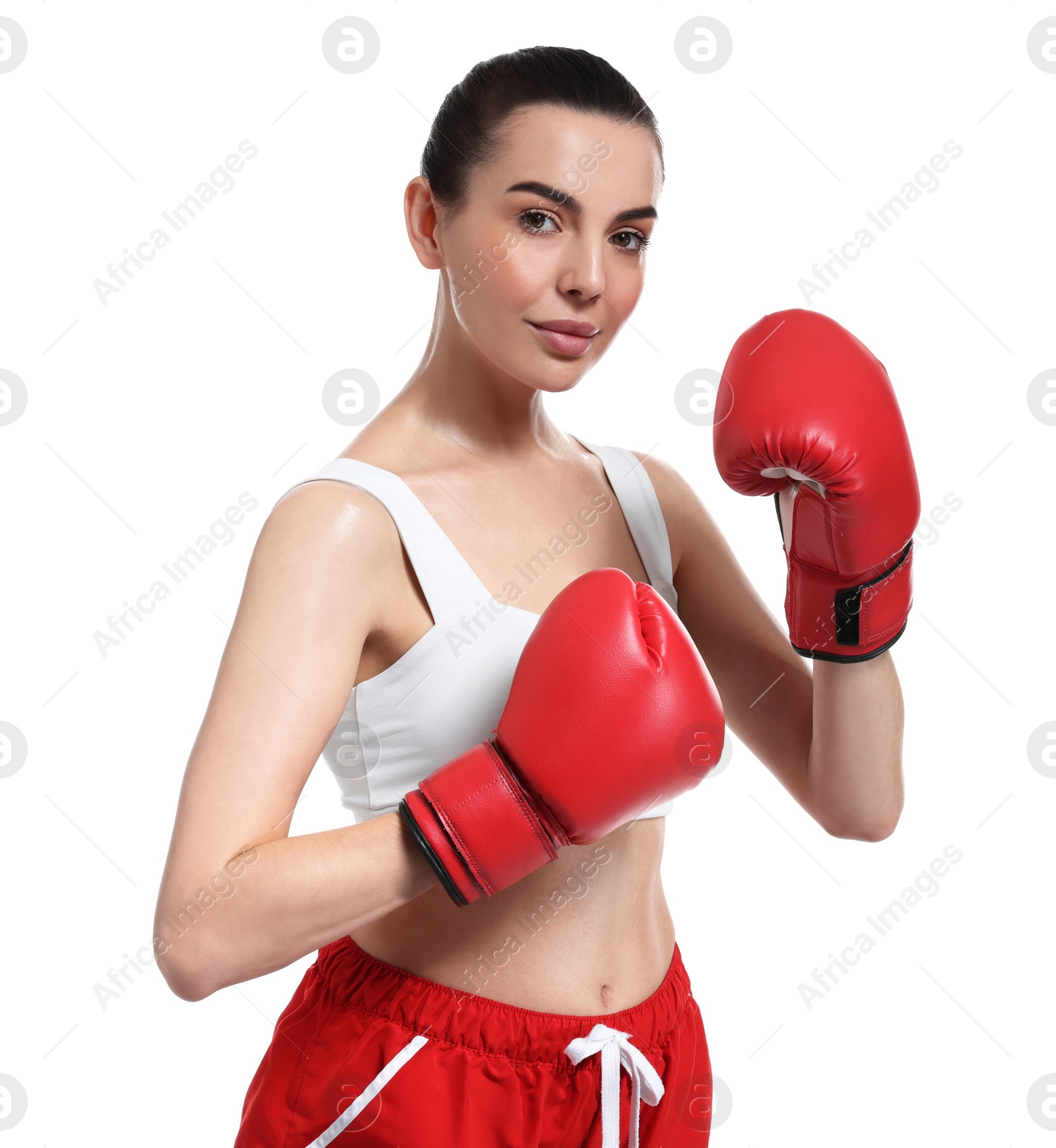 Photo of Beautiful woman in boxing gloves on white background