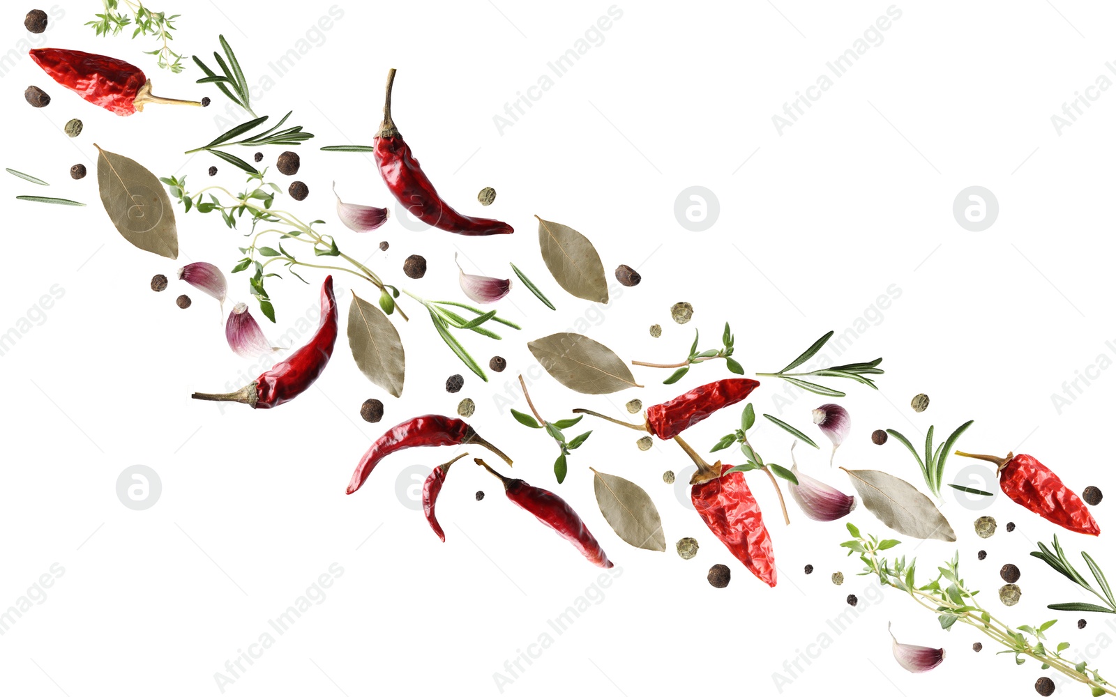 Image of Many different spices flying on white background