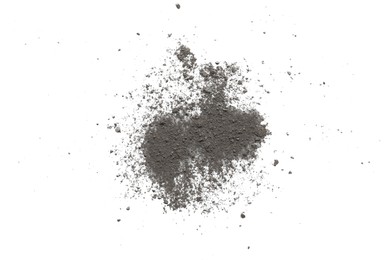 Pile of black dust scattered on white background, top view