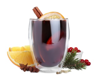 Photo of Aromatic mulled wine and ingredients on white background