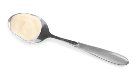Photo of Metal spoon with mayonnaise isolated on white, top view
