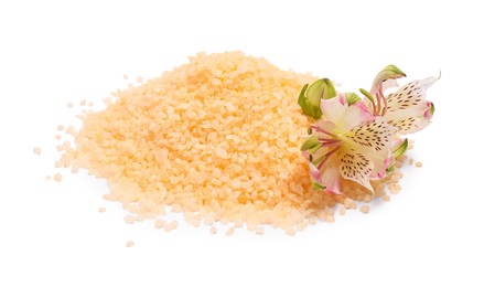 Photo of Orange sea salt and flower isolated on white