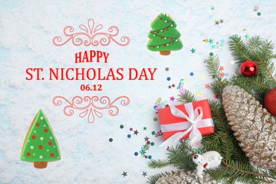 Image of Happy St. Nicholas day, greeting card design. Flat lay composition of fir tree branches and festive decor on snowy background