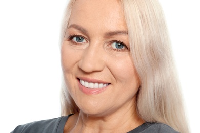 Photo of Portrait of mature woman with beautiful face on white background