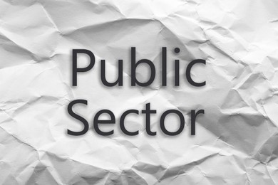 Image of Phrase Public Sector written on sheet of crumpled paper, top view