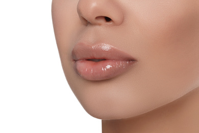 Photo of Young woman with beautiful full lips on white background, closeup