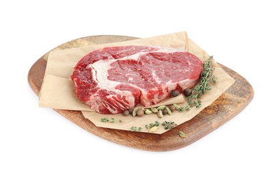 Photo of Piece of fresh beef meat, thyme and spices on white background