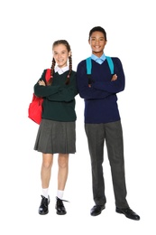 Teenagers in stylish school uniform on white background