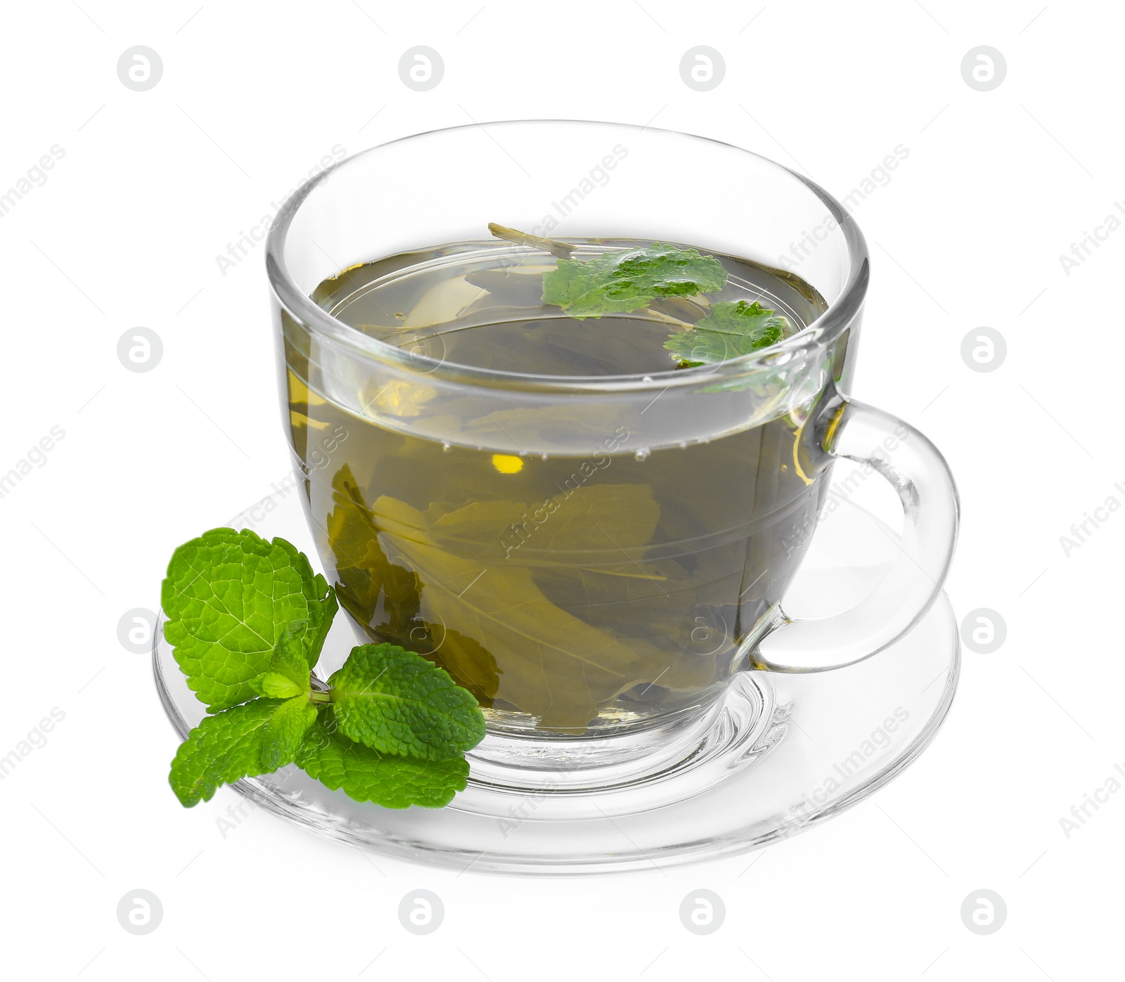 Photo of Fresh green tea in glass cup, mint and saucer isolated on white