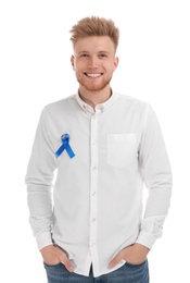 Young man with blue ribbon on white background. Urology cancer awareness