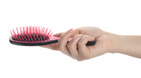 Woman holding modern hair brush on white background, closeup