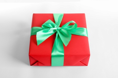 Photo of Beautifully wrapped gift box on white background