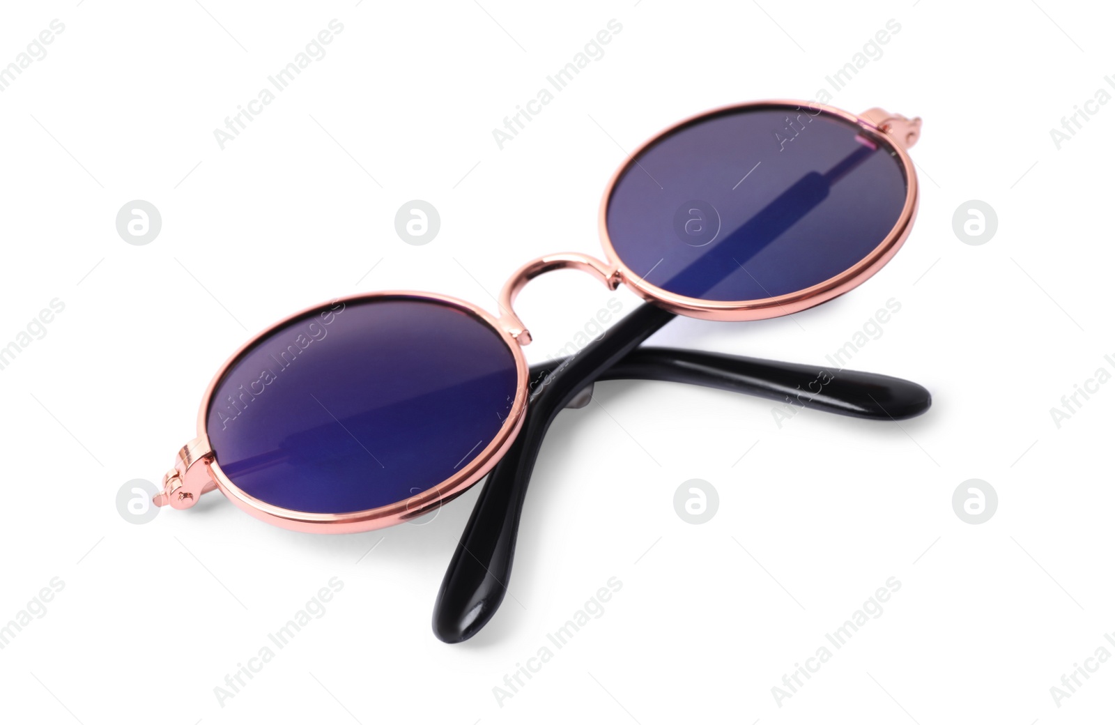Photo of New stylish round sunglasses isolated on white
